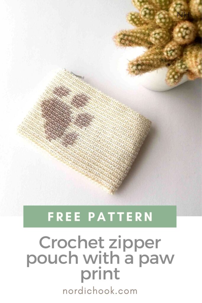 Crochet zipper pouch with a paw print