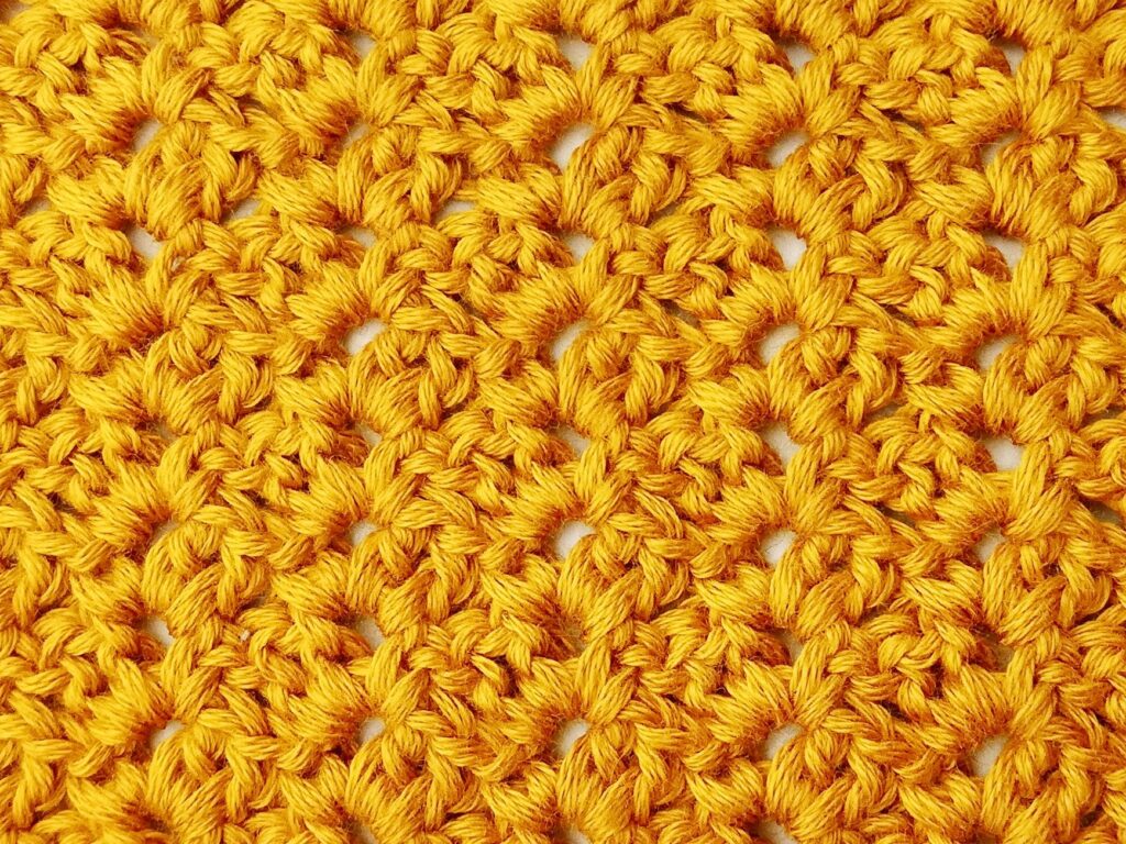 Crochet stitch photo and video tutorial: The mini tulip stitch
